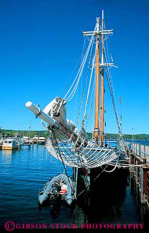 Stock Photo #13255: keywords -  bay bowsprit dock docks great historic lakes line madeline mast michigan old region rope schooner ship ships traverse vert wood wooden