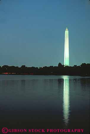 Stock Photo #8722: keywords -  attraction capitol columbia dc district dusk granite illuminate illuminated lighted lighting monument monuments national obelisk of point pointed reflect reflecting reflects rock shape stone tall tourist tower usa vert washington water