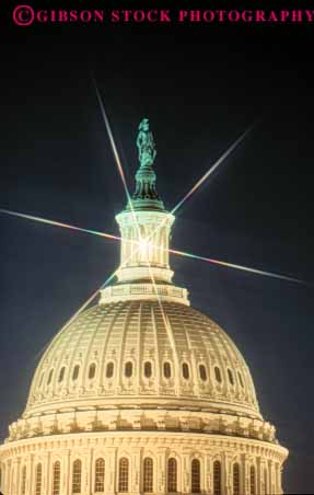 Stock Photo #8744: keywords - america american americana architecture building buildings capitol capitols columbia dark dc design district dome domes dusk evening federal government headquarters national night of office special starburst states sunset sunsets united usa vert washington