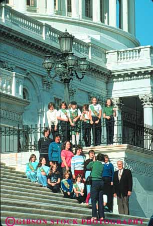 Stock Photo #8752: keywords - america american americana architecture building buildings capitol capitols chaperone chaperones child children class columbia dc design district dome domes federal girl government group groups headquarters national of office parent parents photo photograph pose posed posing school schools scout scouts states tour tourists travelers united usa vert washington youth