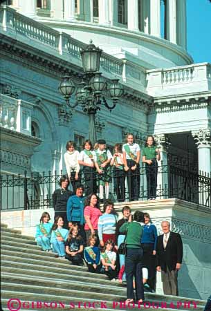 Stock Photo #8752: keywords -  america american americana architecture building buildings capitol capitols chaperone chaperones child children class columbia dc design district dome domes federal girl government group groups headquarters national of office parent parents photo photograph pose posed posing school schools scout scouts states tour tourists travelers united usa vert washington youth