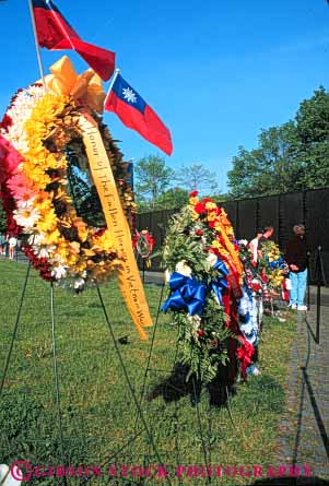 Stock Photo #8797: keywords -  attraction columbia dc destination display district memorial memorialize memorials memory monument monuments nam of public remember remembering remembrance tourist travel tribute tributes vert viet vietnam war wars washington wreath