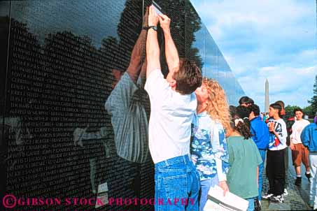 Stock Photo #8798: keywords -  attraction black columbia dc destination display district engrave engraved horz make memorial memorialize memorials memory monument monuments nam name names of people polish polished public reflect reflecting reflection reflects remember remembering remembrance rubbing shiny stone tourist travel tribute tributes viet vietnam war wars washington