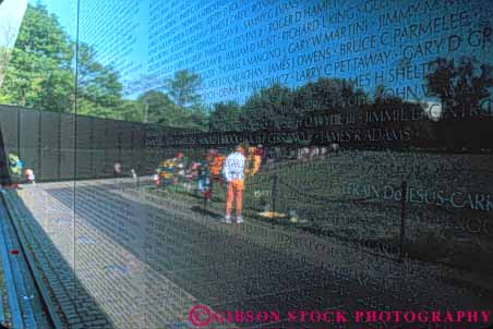 Stock Photo #8800: keywords -  attraction black columbia dc destination display district engrave engraved horz letter memorial memorialize memorials memory monument monuments nam name names of people polish polished public reflect reflecting reflection reflects remember remembering remembrance shiny stone tourist travel tribute tributes viet vietnam war wars washington word words