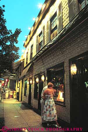 Stock Photo #8812: keywords -  area attraction browse browsing building buildings business businesses columbia community couple dark dc destination district dusk evening georgetown leisure menu of public read relax relaxed restaurant retail shop shopper shoppers shops store stores street summer sunset tourist town travel vert washington