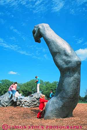 Stock Photo #8813: keywords -  art attraction awakening big city climb columbia dc destination different district giant huge man metal of park parks people playground potomac public sculpture sculptures tourist travel unique unusual vert washington