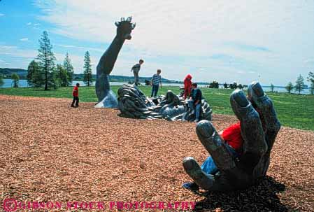 Stock Photo #8816: keywords -  art attraction awakening big city climb columbia dc destination different district finger fingers giant horz huge man metal of park parks people playground potomac public sculpture sculptures tourist travel unique unusual washington