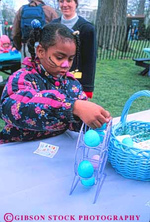 Stock Photo #8820: keywords - activities activity annual attraction black boy boys celebrate celebrating celebration child children color columbia craft dc destination district dye dyes dying easter egg eggs event face fun game games girl girls grass holiday holidays house ist lawn of outdoors outside play playing public roll spring tour travel vert washington white youth