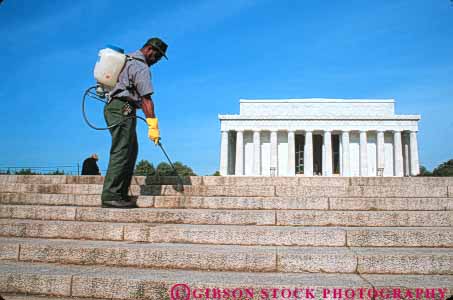 Stock Photo #8829: keywords -  african american architecture black building buildings capitol career columbia control cracks dc destination district employee ethnic herbicide horz job killer l lincoln man memoria minority national occupation occupations of park pest poison service sidewalk spray sprays travel usa washington weed work working