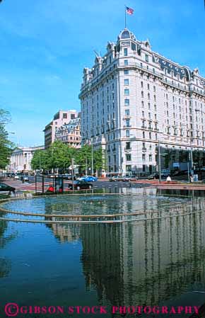 Stock Photo #8849: keywords -  and architecture building buildings capitol columbia dc destination district downtown e fountain in national of office offices reflect reflecting reflection streets travel usa vert washington water