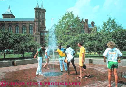 Stock Photo #8858: keywords -  attraction botanical castle columbia dc destination district enid fountain garden gardens haupt horz of people smithsonian summer tourist travel washington