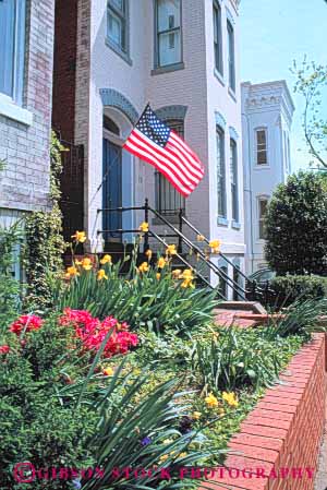 Stock Photo #8875: keywords -  american area building buildings capitol columbia community dc district flag hill home homes house houses in neighborhood neighborhoods of residence residential vert washington