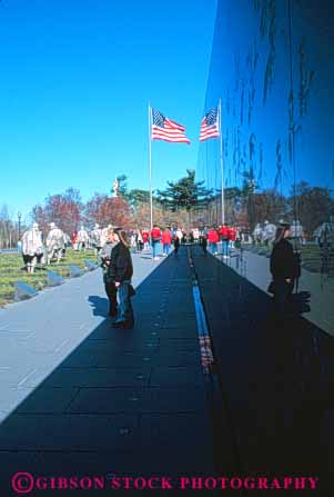 Stock Photo #8908: keywords -  armed attraction columbia commemorate commemorates commemorating dc dedicate dedicated district forces honor korean memorial memorials monument of reflect reflecting reflection reflects shiny soldier soldiers stone tourist vert veteran veterans wall war washington