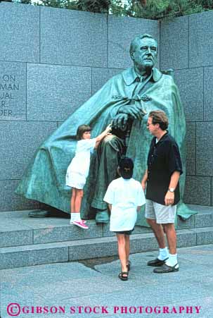 Stock Photo #8913: keywords -  attraction children columbia commemorate commemorates commemorating dc dedicate dedicated delano destination district family father fdr franklin honor memorial memorials monument of parent people president presidential roosevelt single tourist tourists travel travelers vert visitors washington