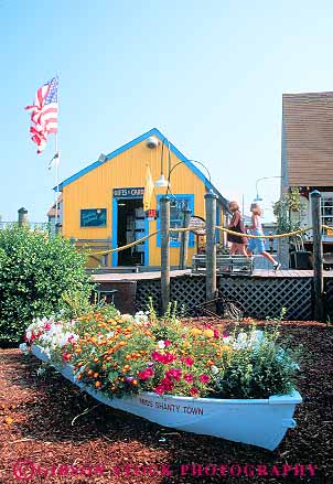 Stock Photo #12421: keywords - city colorful folksy garden landscaping maryland ocean quanit rustic shanty shopping shops store stores town vert