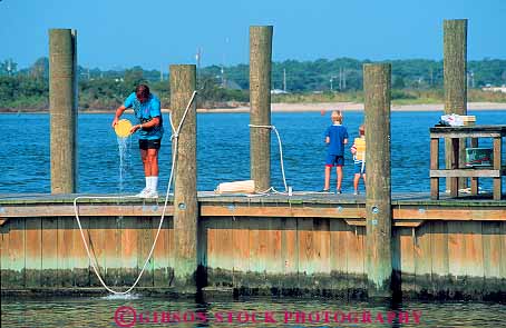 Stock Photo #12422: keywords -  activity and child children city crab dock docks family father fishing fun horz kid kids maryland ocean parent play playing recreation single sport summer together vacation