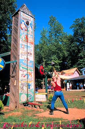 Stock Photo #13267: keywords -  annual contest contests costume costumed crownsville era event fair faire fairs festival festivals hammer hit hits man maryland medieval outdoor outside parties party people renaissance strength thors vert