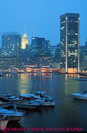 Stock Photo #7593: keywords -  america american architecture baltimore building buildings business center cities city cityscape cityscapes dark downtown harbor inner lighting lights maryland modern new night office reflect reflection reflects skyline skylines urban usa vert water