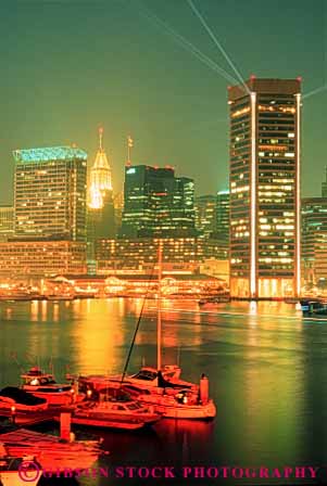 Stock Photo #7594: keywords -  america american architecture baltimore building buildings business center cities city cityscape cityscapes dark downtown harbor inner lighting lights maryland modern new night office reflect reflection reflects skyline skylines urban usa vert water