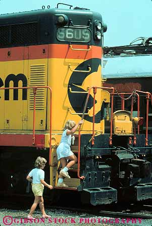 Stock Photo #11157: keywords - and b baltimore big child children climb climbing climbs engine engines girl girls locomotive locomotives maryland museum museums o play playing plays railroad railroads train trains vert