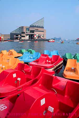 Stock Photo #11158: keywords -  baltimore boat boating boats colorful fiberglass float floats fun harbor harbors inner maryland material peddle plastic play playing recreation rental summer synthetic toy toys vert water