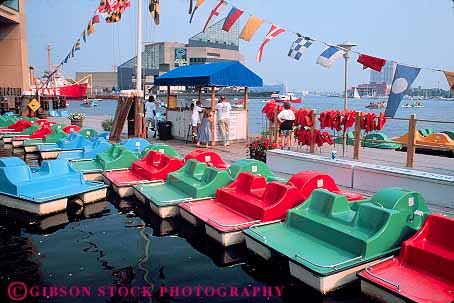 Stock Photo #11160: keywords - baltimore boat boating boats colorful fiberglass float floats fun harbor harbors horz inner maryland material peddle plastic play playing recreation rental summer synthetic toy toys water
