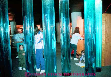 Stock Photo #12431: keywords -  aquarium aquariums baltimore blue clear column cylinder cylinders cylindrical display horz maryland national people pipe plastic public shape shapes synthetic tube tubes water