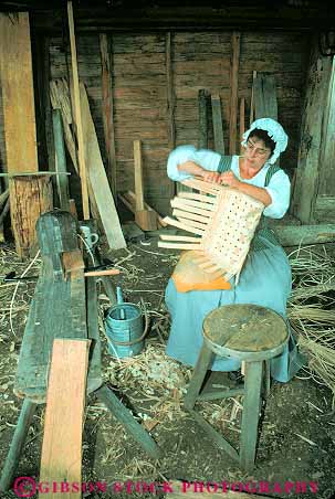 Stock Photo #11583: keywords - american basket building buildings colonial colony community craft crafts early era heritage historic history living maker making museum museums old people person portray portraying preserve preserved recreate recreated reenact reenacted reenacting reenactment restoration restore restored revolution site vert virginia weave weaver weaving williamsburg woman