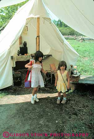Stock Photo #13291: keywords - american children colonial girl girls heritage historic history in living national park parks people reconstructed reconstruction reenactment reenactments revolutionary site sites tent tents vert virginia war wars yorktown