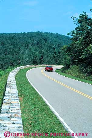 Stock Photo #13295: keywords -  appalachian auto automobile autos car cars countryside forest forests highway highways hill hills landscape mountain mountains national park parks pavement public road rural scenery scenic shenandoah stone street through vert virginia wall wooded