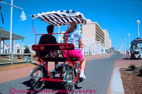 Stock Photo #12352: keywords -  beach bicycle bike boardwalk bright buggies buggy coast coastal couple horz hot motion movement peddle people recreation rental resort shore summer sun sunny sunshine vacation virginia