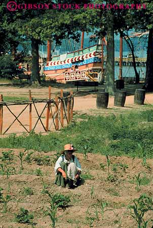 Stock Photo #13327: keywords -  american costume costumed era garden gardens historic history jamestown living museum museums reenact reenactment revolutionary settlement tending vert virginia war woman