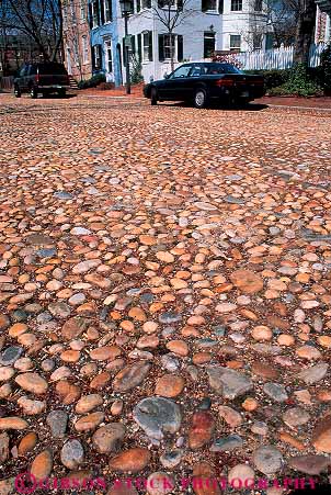 Stock Photo #13332: keywords -  alexandria american boulder boulders bump bumpy cobble cobbles cobblestone historic history princess river road roadway rough round stone stones street surface tradition traditional vert virginia