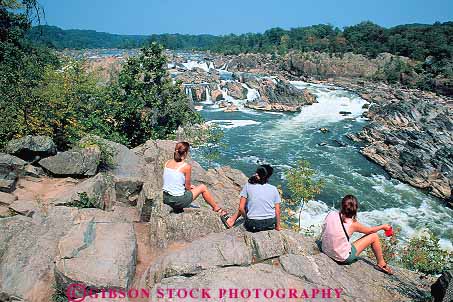 Stock Photo #13341: keywords -  adult eroded eroding erosion falls girls great horz landscape natural nature outdoor outdoors outside park people potomac rapid rapids relax relaxes relaxing river rivers rock rocky scenery scenic sit sits sitting summer teen teenage teenagers teens together turbulence turbulent virginia water waterfalls women young youth