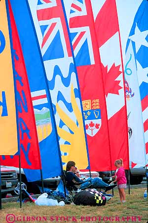 Stock Photo #13383: keywords -  angle angles banners brookings coast coastal coastline coasts color colorful colors fair fairs festival geometric geometrical geometry kite kites material near nylon oregon pattern patterns people shape shapes shore shoreline shores sit synthetic vert