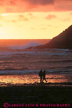 Stock Photo #13385: keywords -  alone beach beaches bright coast coastal coastline coasts couple couples dark devils dusk elbow evening landscape ocean orange oregon outdoor outside park privacy private romantic scenery scenic sea shore shoreline shores solitary solitude state stroll stroller strollers strolling sunset sunsets vert walk walkers walking walks water yellow