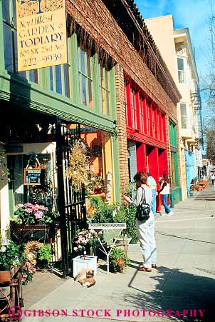 Stock Photo #11240: keywords -  buildings northwest old oregon people portland renovate renovated shop shopper shoppers shopping shops sidewalk store storefront stores street vert