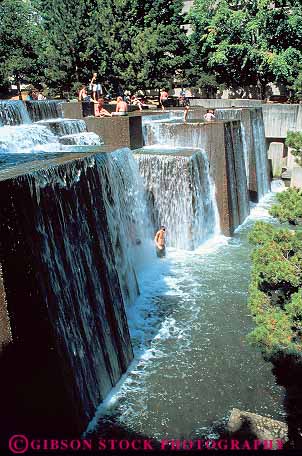 Stock Photo #11247: keywords -  artificial downtown fountain fountains fun in keller oregon people play playing portland summer swim vert water waterfall waterfalls wet