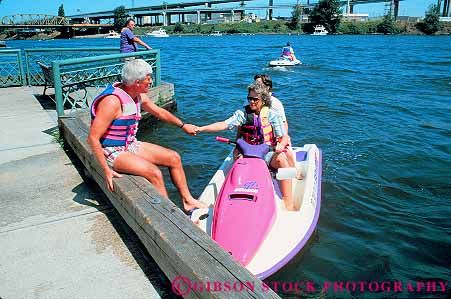 Stock Photo #11268: keywords -  assist assistance assisting assists boat boating couple device dock docking docks flotation help helper helping helps horz jet jumper man material oregon people person personal plastic portland recreation river safety ski skidoo skiers small synthetic vests water wave willamette woman