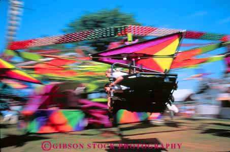 Stock Photo #11280: keywords -  action activities activity annual blur blurred child children dynamic event fair fairs festival festivals fun gather gathering horz motion move movement moving oregon people play playing portland ride rides rose social thrill