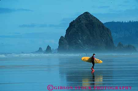 Stock Photo #13405: keywords -  beach beaches cannon coast coastal horz landscape landscapes northwest ocean oregon people person resort sand scenery scenic scenics sea shore shoreline shorelines summer surfer surfing up walking