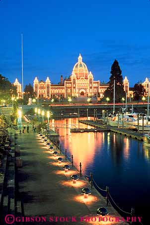 Stock Photo #13431: keywords - and attraction bright british building canada columbia dark destination dusk evening government harbor harbors inner lighting lights northwest parliament summer sunset sunsets travel vert victoria waterfront waterfronts
