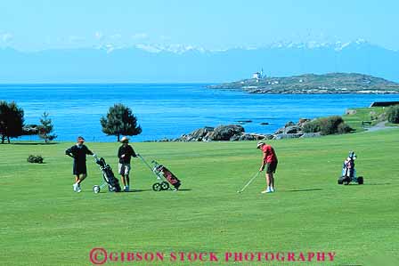 Stock Photo #13451: keywords -  attraction british canada club coast coastal columbia destination golf golfer golfers golfing grass green horz landscape lawn northwest outdoor outside people recreation scenery scenic shore shoreline sport summer tourist travel victoria