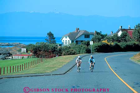 Stock Photo #13453: keywords - attraction beach bicycle bicycles bicycling bike bikes british canada coast coastal columbia couple destination drive exercise exercising fitness horz northwest outdoor outside peddle peddlers peddling people physical recreation ride riders riding road roads shore shoreline sport street summer tourist travel victoria workout