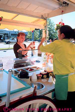 Stock Photo #13456: keywords -  attraction british business buy buyer buyers buying buys canada columbia cone cream destination food ice northwest outdoor outside people recreation sidewalk small snack street summer sunny tourist travel vendor vendors vert victoria woman