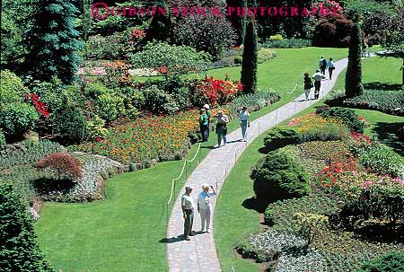 Stock Photo #13460: keywords - attraction botanic botanical british buchart butchart canada columbia cultivated cultivation garden gardens green horz landscaping northwest path paths people plant plants public spring stroll strolling summer tour touring tourist trail trails victoria walk walking