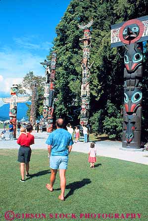 Stock Photo #12376: keywords - british columbiacanada families family in municipal park parks people pole poles public stanley summer totem vancouver vert view