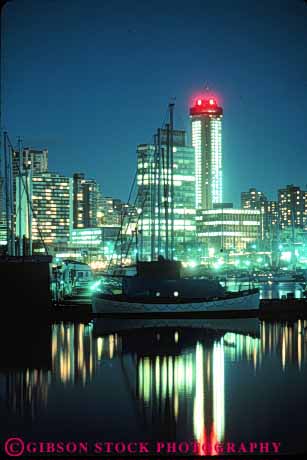 Stock Photo #7611: keywords -  architecture boat bright british building buildings business canada canadian center cities city cityscape cityscapes columbia downtown dusk evening harbor harbors lighting lights marina modern new office reflect reflecting reflection ship skyline skylines urban vancouver vert water