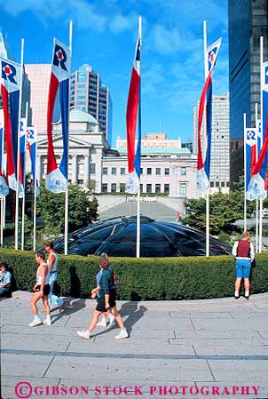 Stock Photo #12379: keywords -  banner banners british cities city columbia downtown park parks people public robson square summer urban vancouver vert