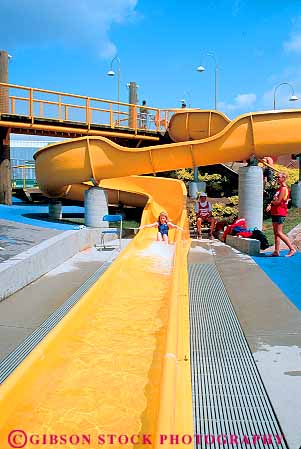 Stock Photo #12070: keywords -  british canada columbia fun girl granville gravity island material park parks people plastic play playing recreation season slides sliding slip slippery slips smooth summer synthetic vancouver vert water waterslide wet yellow